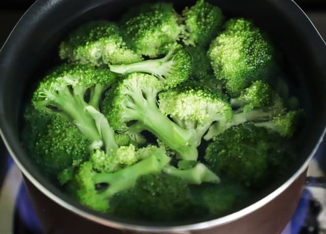 a bowl of sliced broccoli