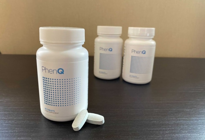 PhenQ bottles and pills